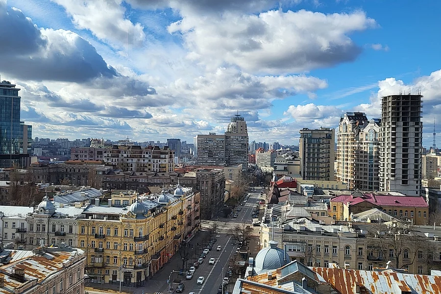 The photo shows a panorama of the central part of Kyiv, photographed from above.