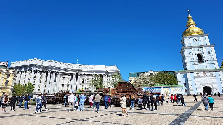 The photo shows St. Michael's Square in Kyiv. On the right is the bell tower of the St. Michael's Golden-Domed Monastery. On the left is the building of the Ministry of Foreign Affairs of Ukraine. In the center of the square you can see an exhibition of destroyed Russian military equipment.
